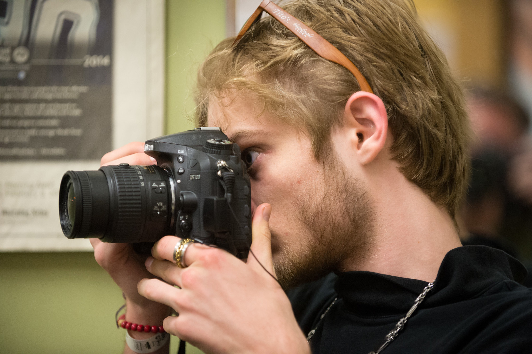 male student using camera